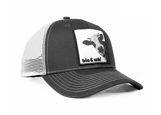 dark grey and white animal patch trucker hat